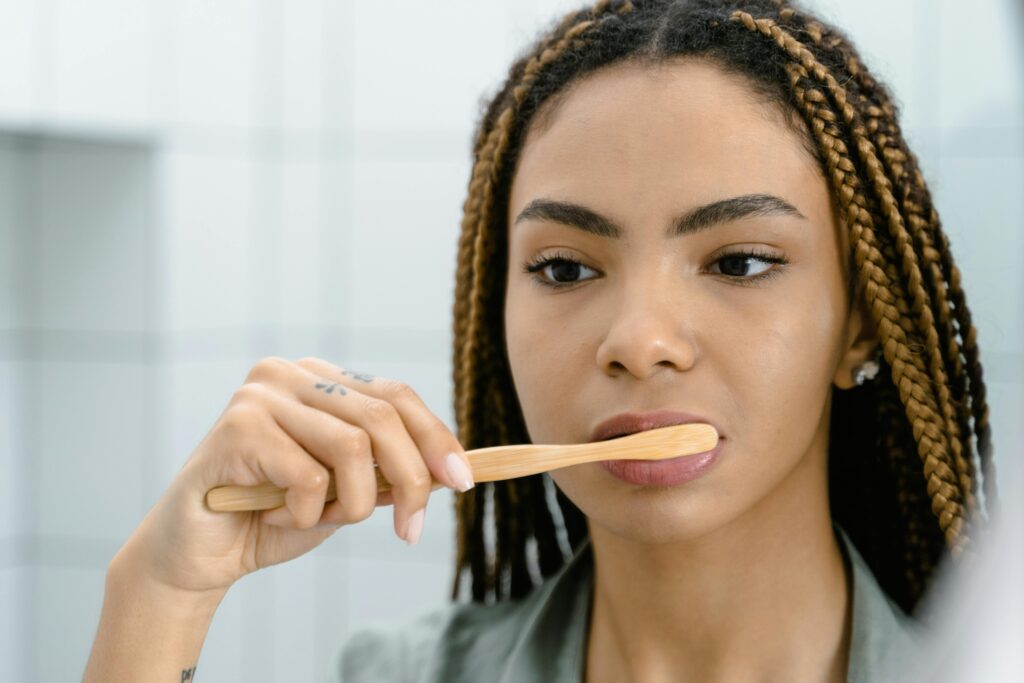 girl brushing braces